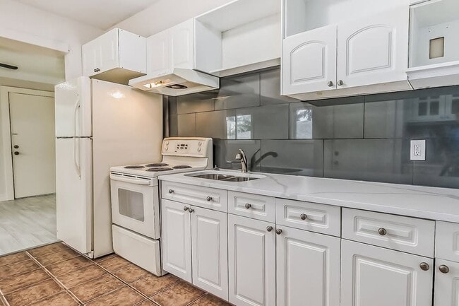 Photo - 1028-9 9 St SE