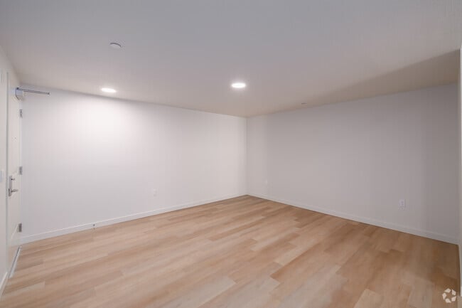 4BR, 2BA - 1,400SF - Living Room - Symphony at Del Sur