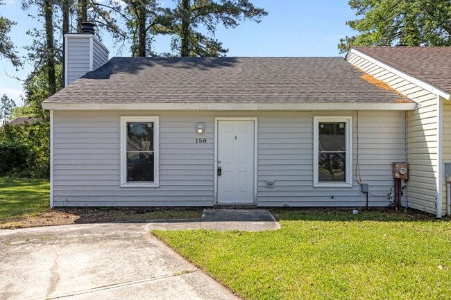 Building Photo - Welcome to Village Cedars!