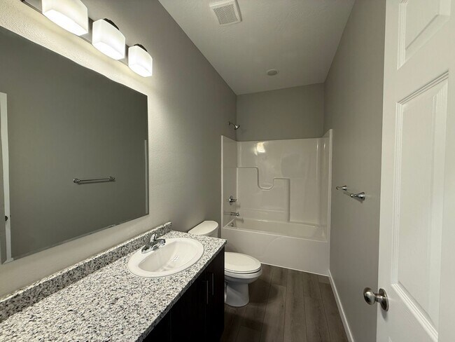 Photo - Water, sewer, and lawn care provided