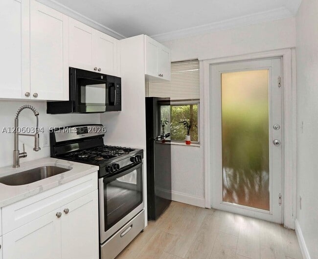 Building Photo - 6831 Abbott Ave Unit 3