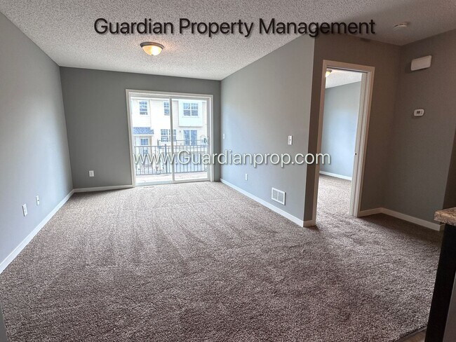 Photo - Champlin Town Home, 2 Car Garage, Dishwasher, Washer/Dryer, Balcony, May/June Move in Dates