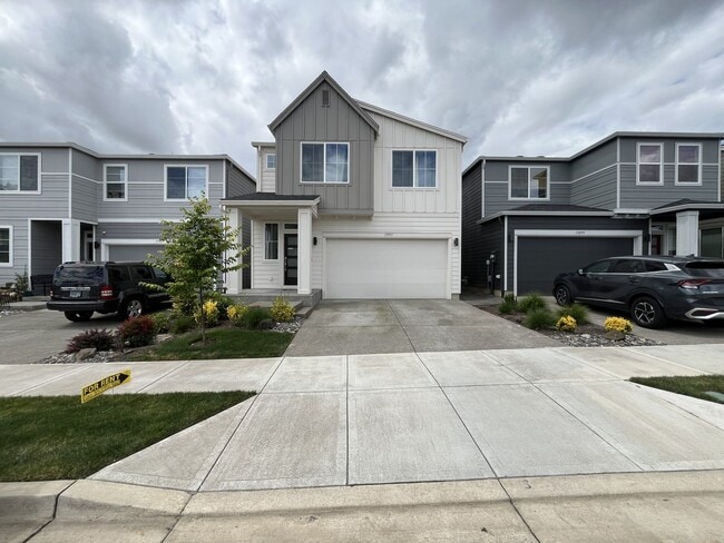Building Photo - Modern 2024-Built Home Near Bull Mountain with Five Bedrooms, Loft, Main-Level Bedroom, and Cover...