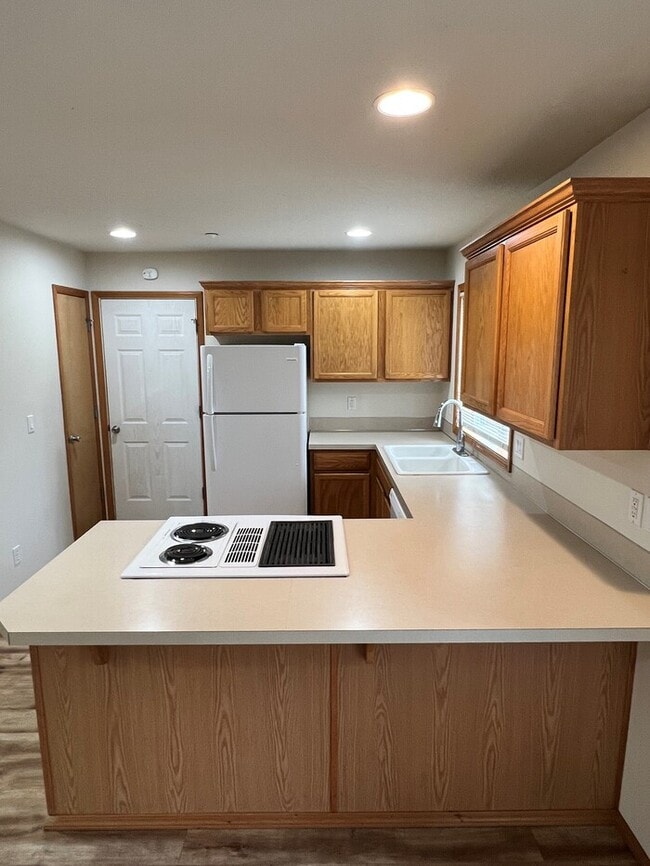 Photo - Beautiful Home with LVP Flooring, W/D, Garage, Back Yard, and MORE!