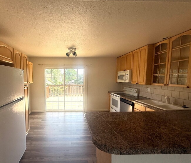 Photo - Spacious 4 Bedroom Home in Meadowood Neighborhood in East Aurora and Minutes to Buckley SFB