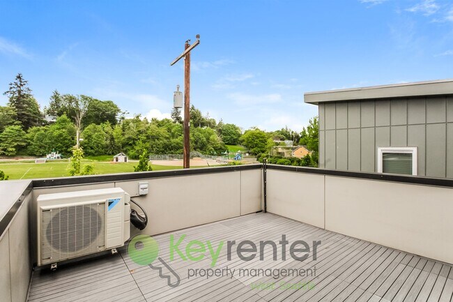 Photo - Modern 3 Bedroom with Rooftop Deck and In Unit Laundry
