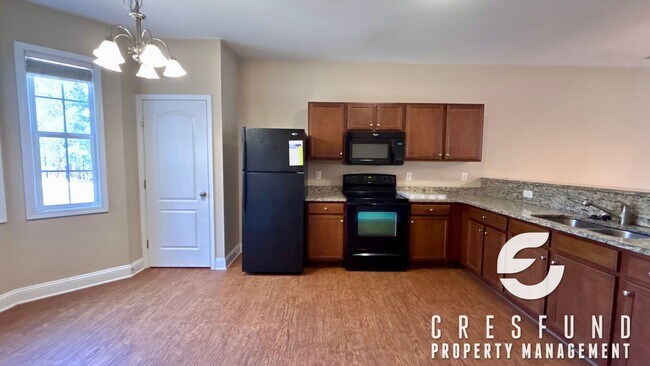 Photo - 2 BED, 2 BATH TOWNHOME WITH GARAGE AVAILABLE NOW!!!!!!!!!