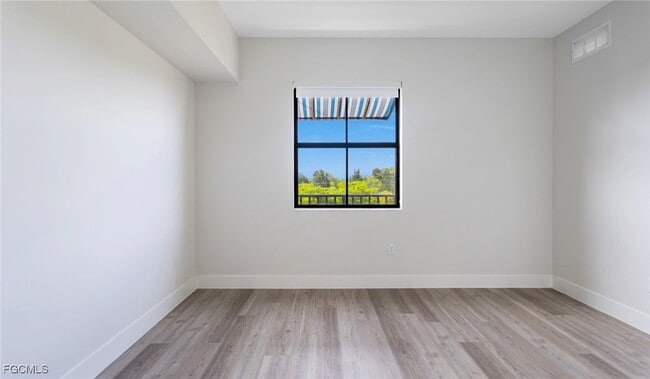 Building Photo - 22980 Vista Edera Cir Unit 4-306