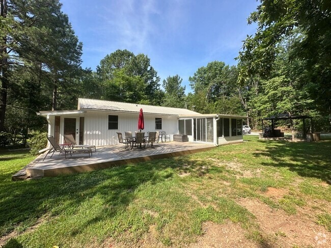Building Photo - This FULLY FURNISHED ALL INCLUSVIE HOME IS...