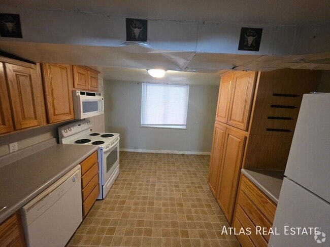 Building Photo - 2208 N 10th Ave Unit C Rental