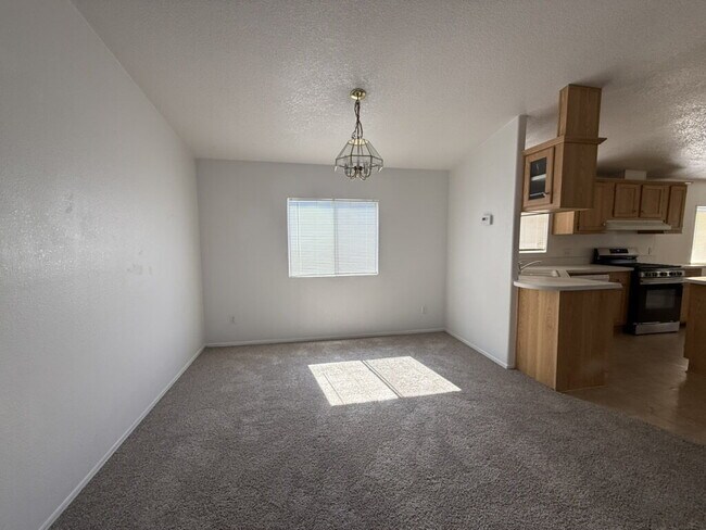 Photo - 3 bed 2 bath home with a large yard. BHCRE... Unit B