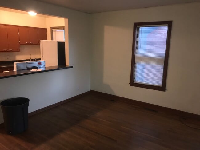 Living room with bar to kitchne - 221 State St Unit 1