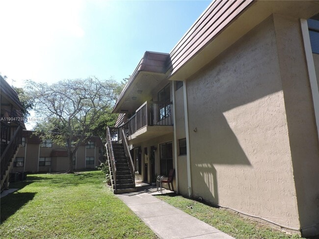 Building Photo - 14867 SW 104th St Unit 24-21