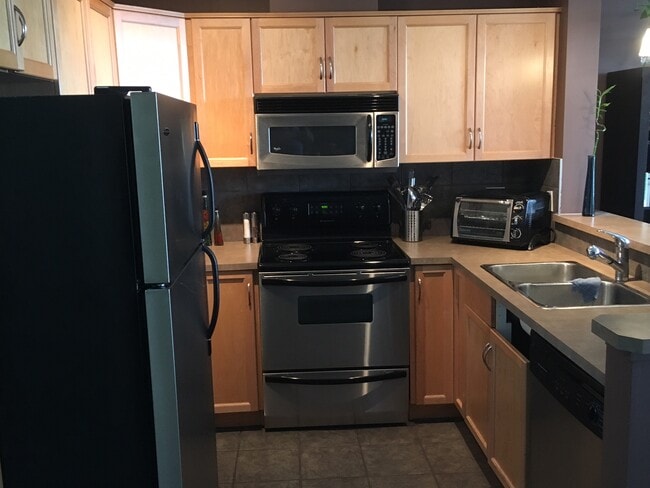 Photo - 2-116 Rockyledge Vw NW Unit 116