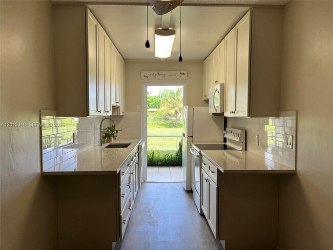 Photo - 6550 Royal Palm Blvd Unit 105A