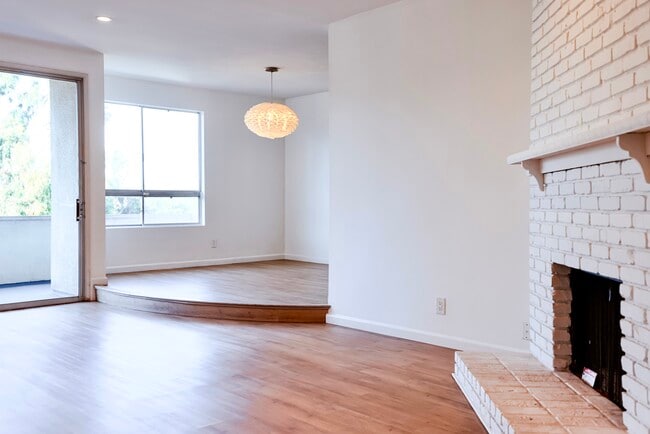 fireplace and dining room - 10650 Holman Ave Unit 306