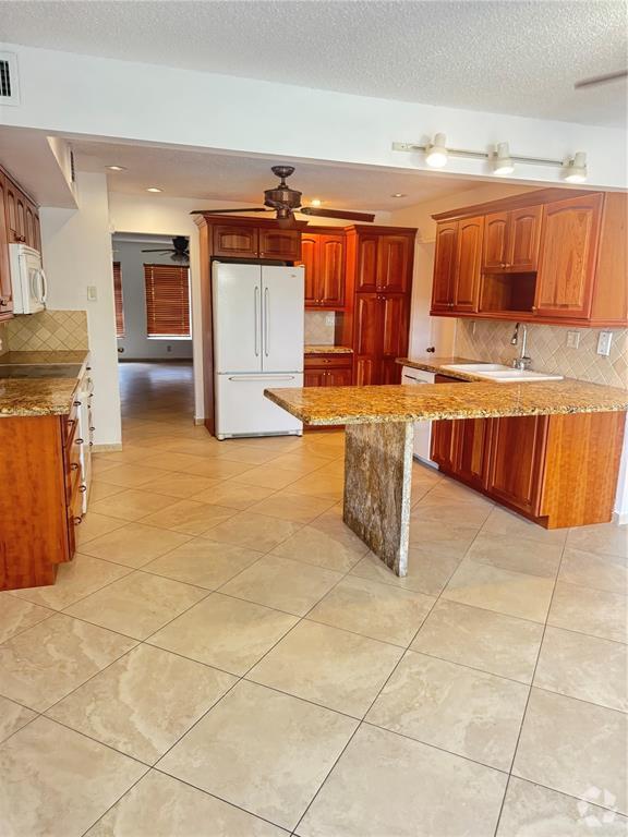 Building Photo - 3111 Coral Springs Dr Unit 3111 Rental