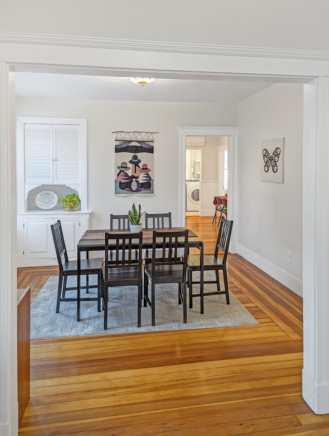 Dining room into kitchen with south-facing windows - 22 Reed St Unit 2