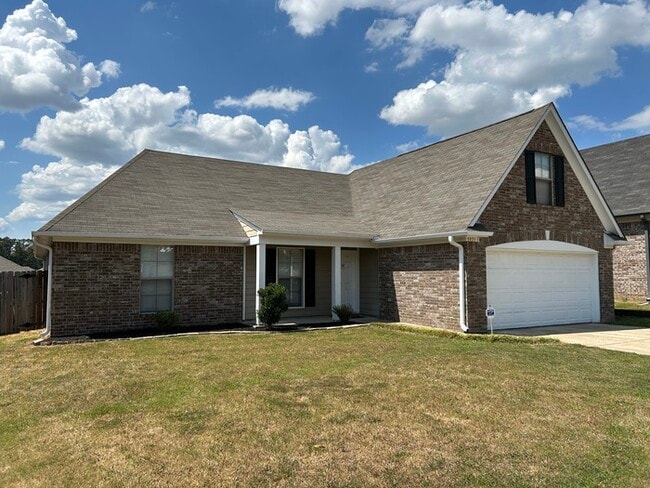 Photo - SOUTHAVEN STUNNER! 3BR/2BA | Vaulted Ceilings & Fireplace | Fenced Yard!
