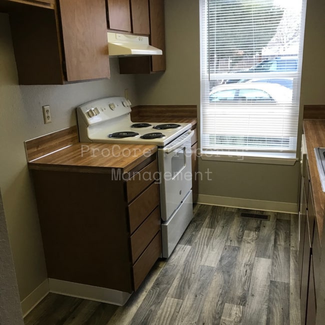 Photo - $1300...2Bed 1.5 Bath, Small Fenced in Covered Patio on Back, Storage