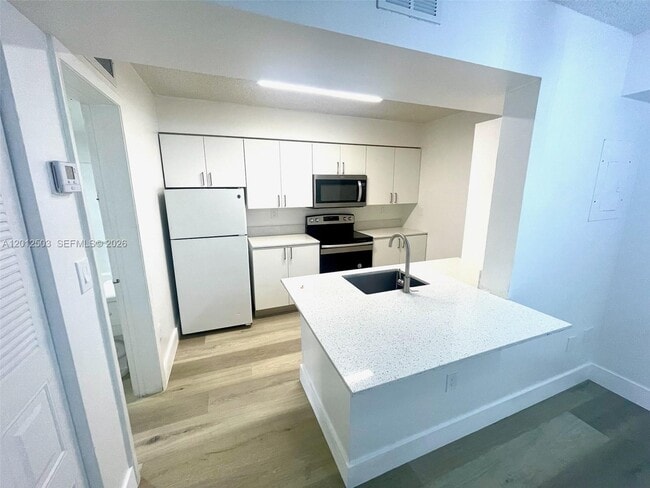 Building Photo - 15201 SW 80th St Unit 205
