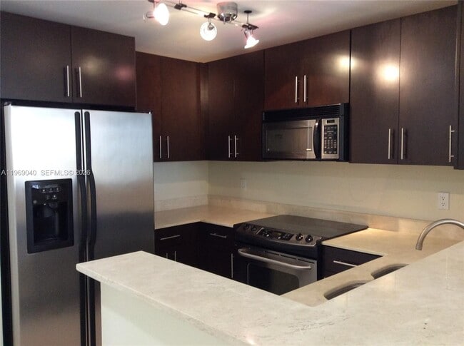 Building Photo - 10 Aragon Ave Unit 1119