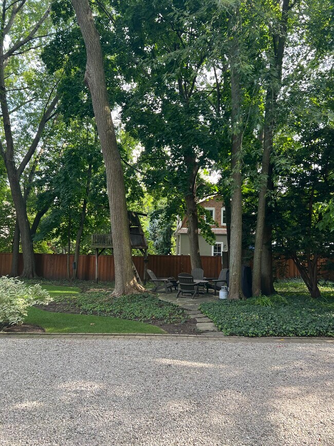 Tenant Patio with table, Adirondack chairs and grill - 1228 Forest Ave Unit #3