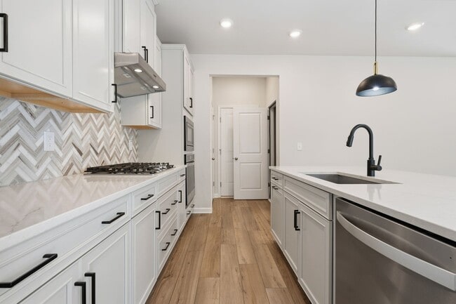 Photo - Move-In Ready 4BR Home | Deck, Patio & Open Concept Living