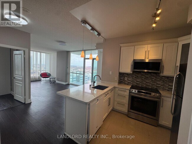 Photo - 220 Burnhamthorpe Rd W Unité 2009