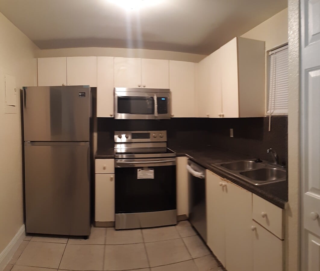 Kitchen before upgrade - 4215 N University Dr Unit 101