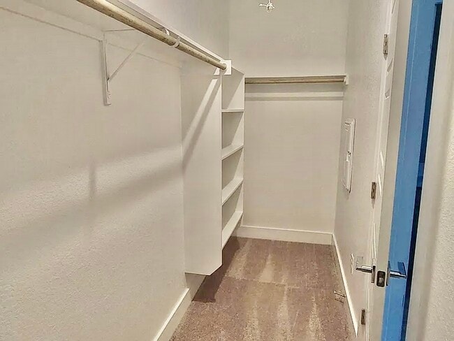 Primarty closet (we have added more clothing rods since this pic) - 521 Peace Dr