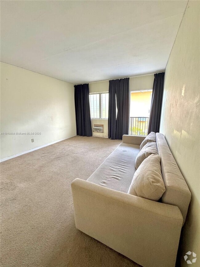 Building Photo - 8132 Harding Ave Unit 11 Rental