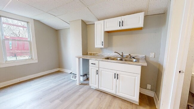 Building Photo - 3409 W.60th St. Unit Back