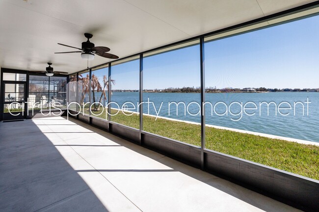 Photo - Stunning Double Waterfront 4/3 Home with Dock and Electric Boat Lift