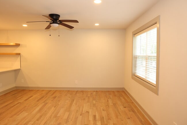 Well-lit living area with recessed lighting - 3170 Altson Townhomes