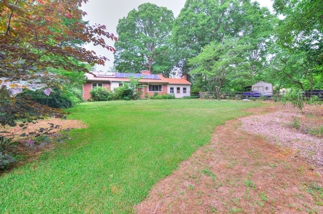Building Photo - Fruit Trees + 2.5 Acres + a Chicken Coop! Near Hillsborough, Durham, and Eno River State Park! - ...
