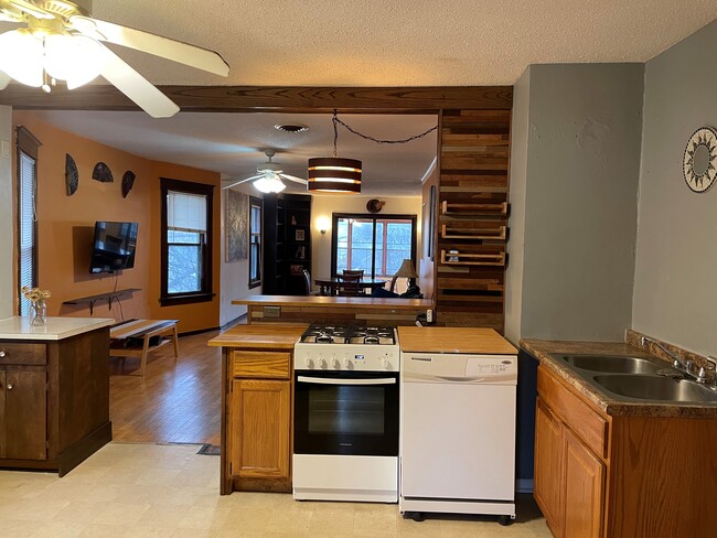 2nd Floor kitchen, dining living room view - 2320 Monroe St NE Casa Adosada