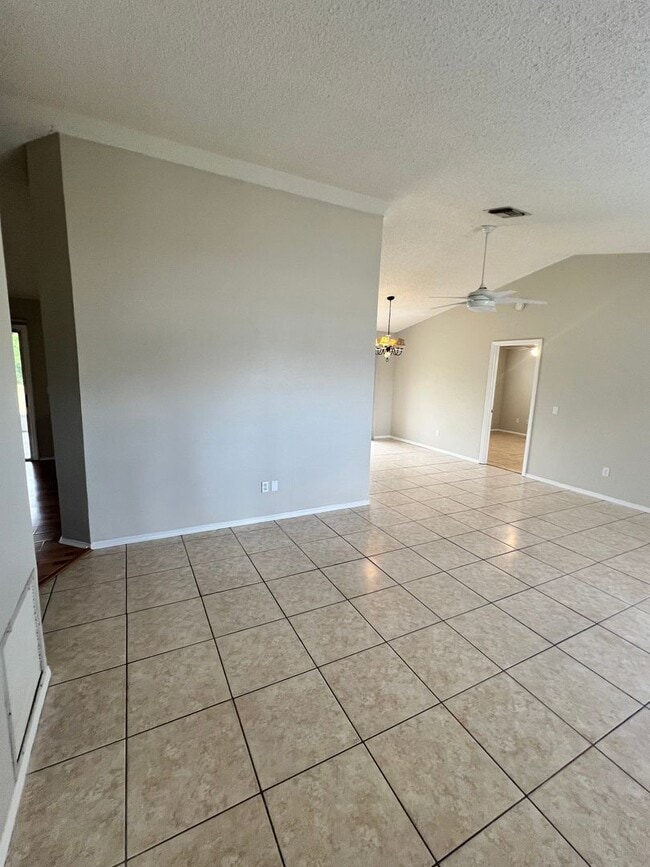 Photo - COZY 3 BEDROOM, 2 BATH HOME WITH TILE & LAMINATE THROUGHOUT, PRIVATE SCREENED PATIO