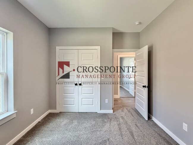 Photo - Spacious 4-Bedroom Home with 2.5 Bathrooms, 2-Car Garage & Fenced Yard