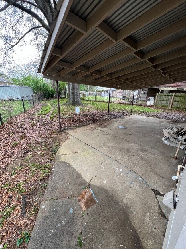 Photo - 2 Bed 1.5 Bath House with extra room that could be used as a extra Bed Room.  Yard Care Included....