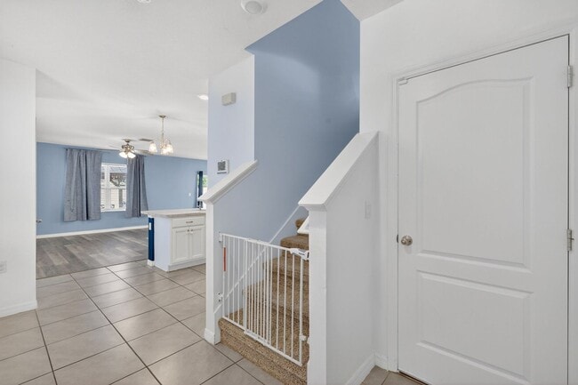 Photo - Available Now! 4BR Home in Avalon Park with Fenced Yard & Resort-Style Amenities