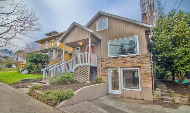 This 5 bedroom 3 bath is within 15 minutes of the UW main campus. 1 block from Burke Gilman trail. - 110 NE 40th St