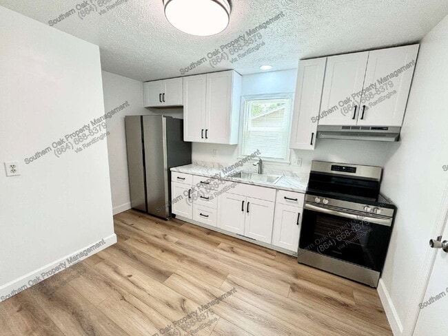 Photo - 104 Caron Ln