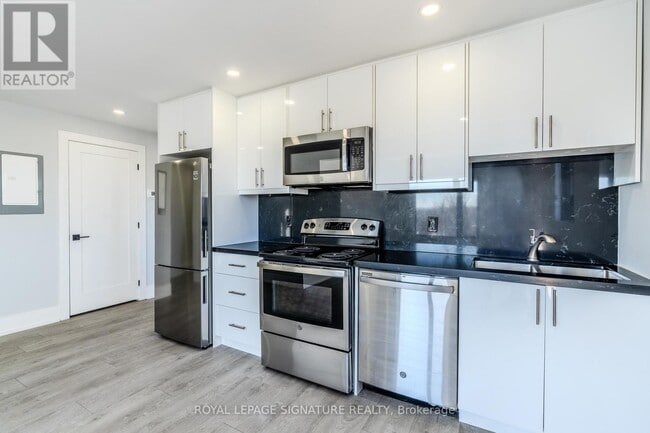 Photo - 66 John St W Unité 302