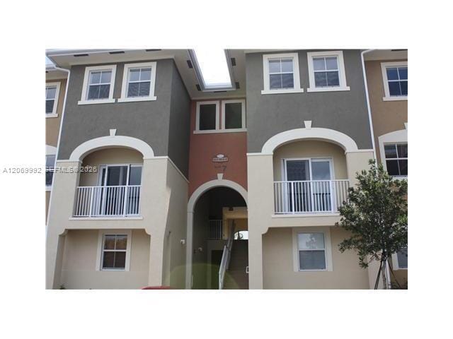 Building Photo - 10870 NW 88th Terrace Unit 208