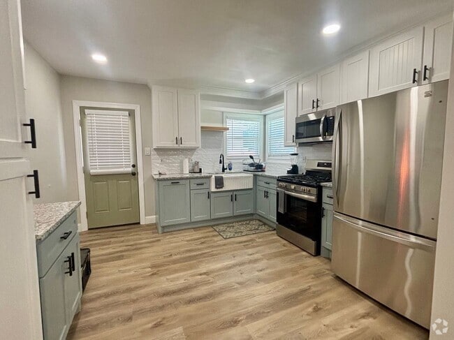 Building Photo - 7402 Japonica St Rental