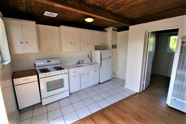 Photo - Private, sunny top floor 1BD/1BA unit in a gated community, and only three blocks from N Berkeley... Unit 1228 A