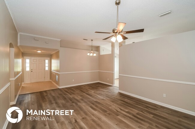 Building Photo - 7104 Rapid River Dr W Rental