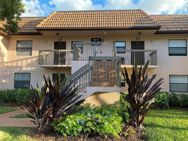Building Photo - 10468 NW 10th St Unit 204