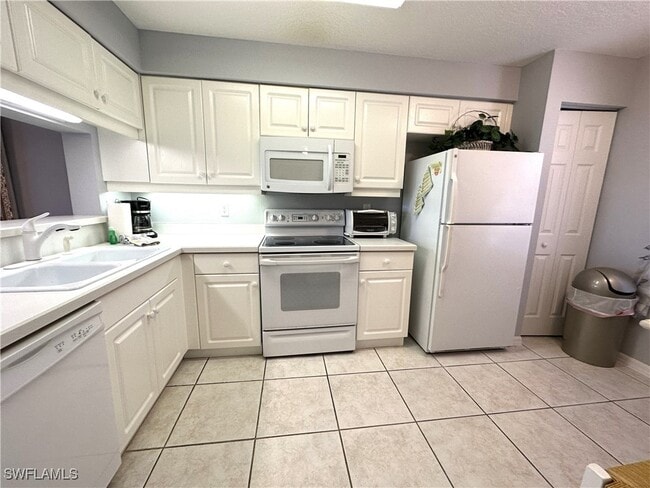 Building Photo - 6670 Huntington Lakes Cir Unit 103 Rental